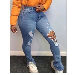 Trendy Blue rip jeans with split and the bottom